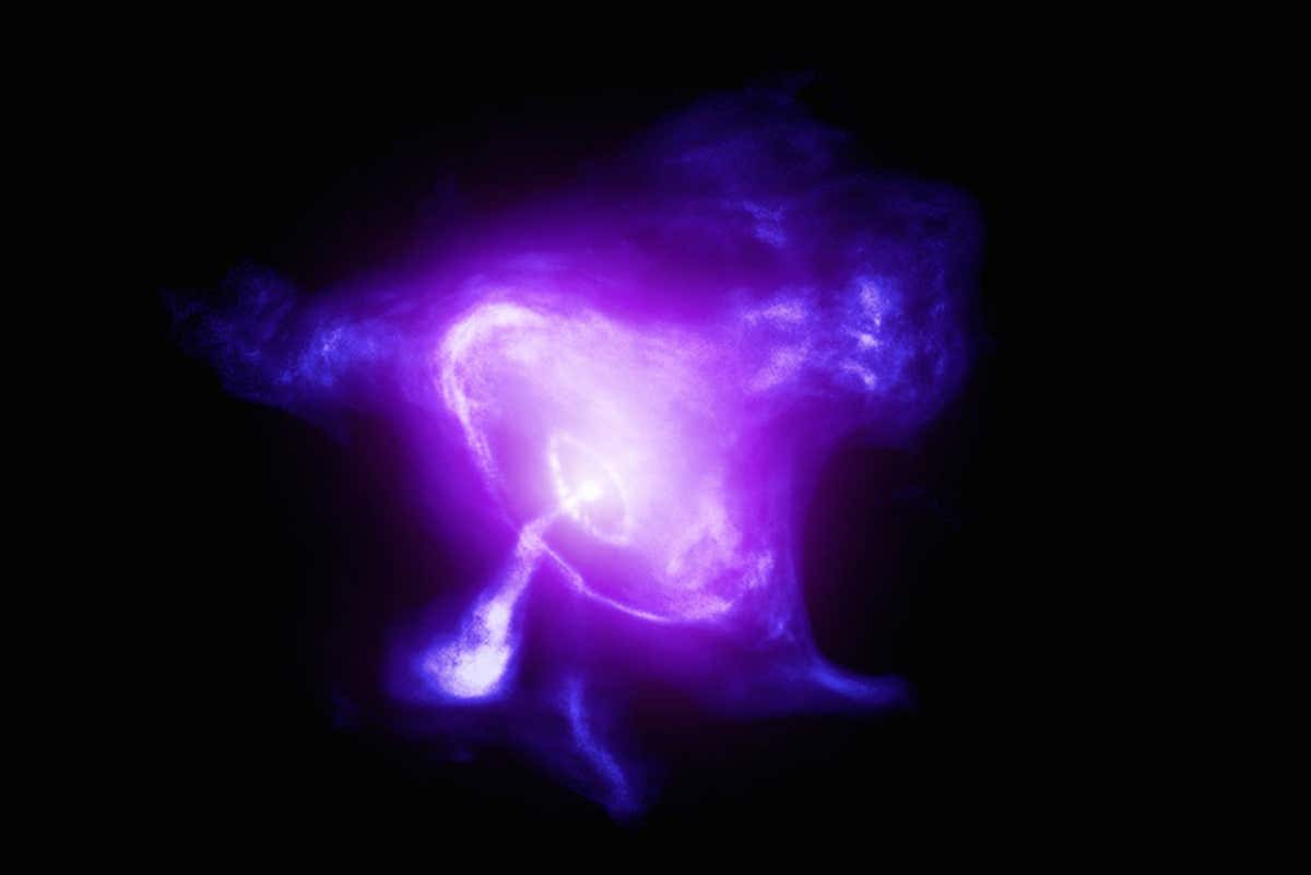 A composite image of the Crab Nebula features X-rays (blue and white), optical data (purple), and infrared data (pink)