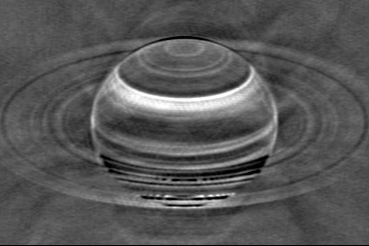 A radio image of Saturn showing traces of past storms