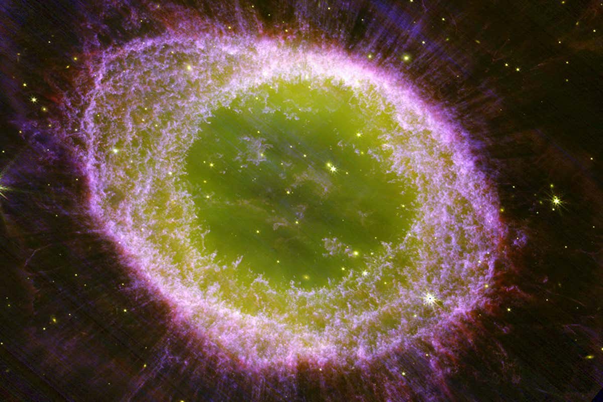 A lime green circle with an oblong purple ring around it in space
