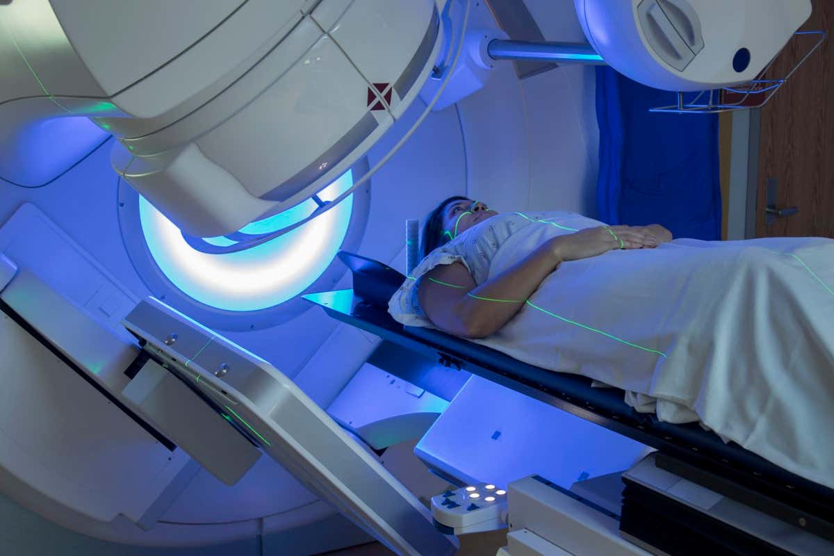 A woman receiving radiation therapy for breast cancer