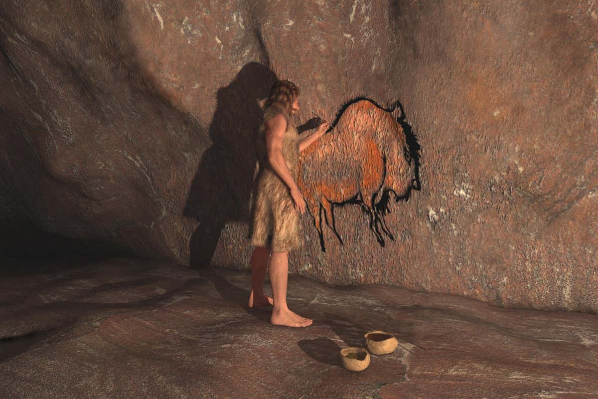 RGAJ63 Caveman painting in a cave