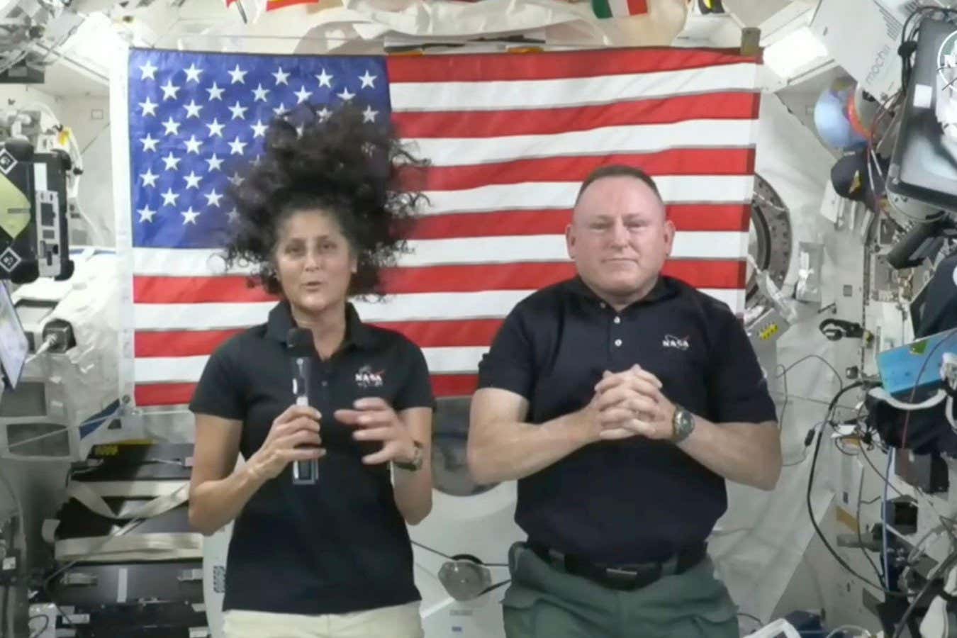 2XGTH8A In this image from video provided by NASA, astronauts Suni Williams, left, and Butch Wilmore give a news conference aboard the International Space Station on Wednesday, July 10, 2024. (NASA via AP)