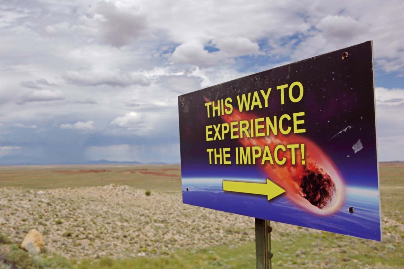 2HAJ7KN This way to experience the impact - sign on the road to Meteor Crater, Northern Arizona, USA