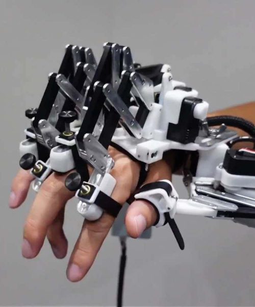 Robotic exoskeleton can train expert pianists to play faster