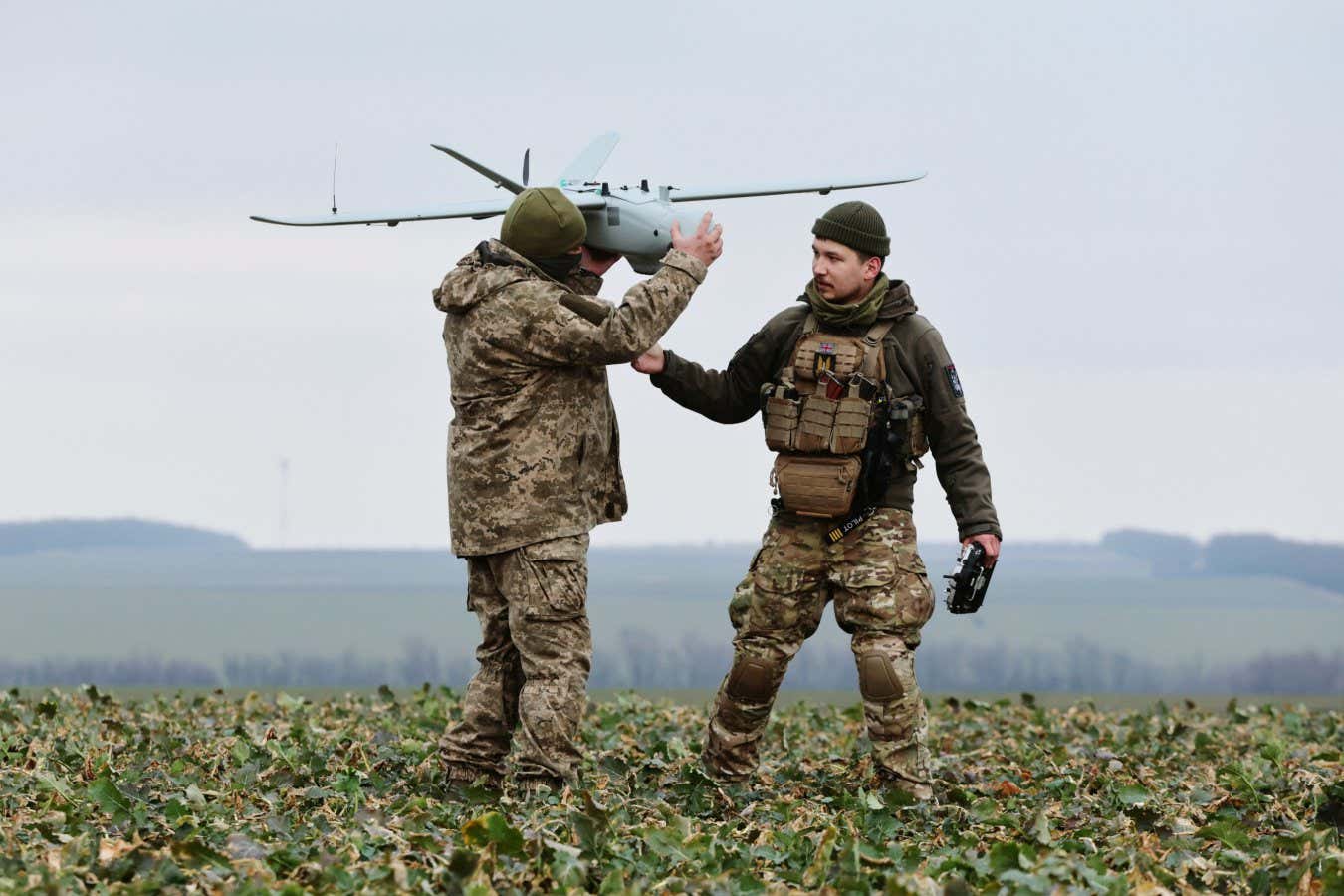 Mandatory Credit: Photo by KATERYNA KLOCHKO/EPA-EFE/Shutterstock (14349659f) Ukrainian servicemen from the 108th Brigade of Territorial Defence prepare to fly a Ukraine-made multi-purpose drone Leleka-100 on a field near a frontline in the direction of Zaporizhzhia, Ukraine, 15 February 2024, amid the Russian invasion. Russian troops entered Ukrainian territory on 24 February 2022, starting a conflict that has provoked destruction and a humanitarian crisis. Ukraine's Territorial Defense Brigade operates drones near Zaporizhzhia frontline - 15 Feb 2024