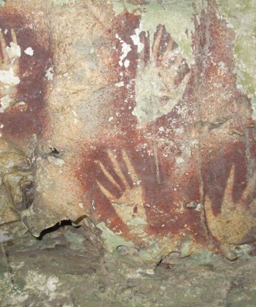 Oldest known rock art is a 68,000-year-old hand stencil with claws