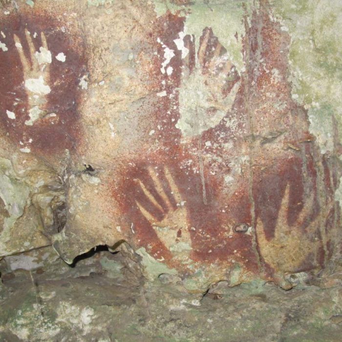 Oldest known rock art is a 68,000-year-old hand stencil with claws