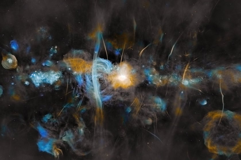 An image of the Milky Way captured by the MeerKAT radio telescope array The image spans 1,000 light-years. At the center of the MeerKAT image the region surrounding the Milky Way?s supermassive black hole blazes bright. Huge vertical filamentary structures echo those captured on a smaller scale by Webb in Sagittarius C?s blue-green hydrogen cloud. Like a super-long exposure photograph, MeerKAT shows the bubble-like remnants of supernovas that exploded over millennia, capturing the dynamic nature of the Milky Way?s chaotic core. Astronomers think the strong magnetic fields in the heart of the galaxy are shaping the filaments seen by MeerKAT and Webb, and may also play a role in suppressing star formation in the region. Though there is a rich cloud of raw star-making material in Sagittarius C, star formation rates are not as high as astronomers expect. Instead, magnetic fields may be strong enough resist the gravity that would typically cause dense clouds of gas and dust to collapse and forge stars.
