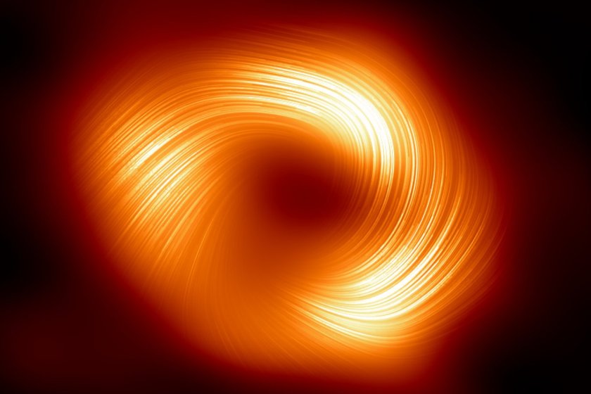 The Event Horizon Telescope (EHT) collaboration, who produced the first ever image of our Milky Way black hole released in 2022, has captured a new view of the massive object at the centre of our Galaxy: how it looks in polarised light. This is the first time astronomers have been able to measure polarisation, a signature of magnetic fields, this close to the edge of Sagittarius A*. This image shows the polarised view of the Milky Way black hole. The lines overlaid on this image mark the orientation of polarisation, which is related to the magnetic field around the shadow of the black hole.