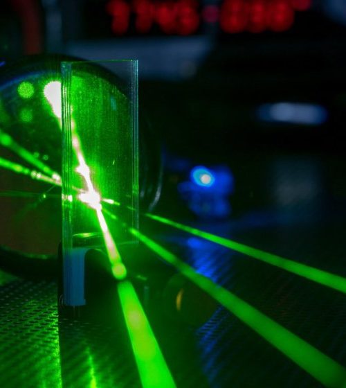Swimmer made of quantum light breaks Newton’s third law