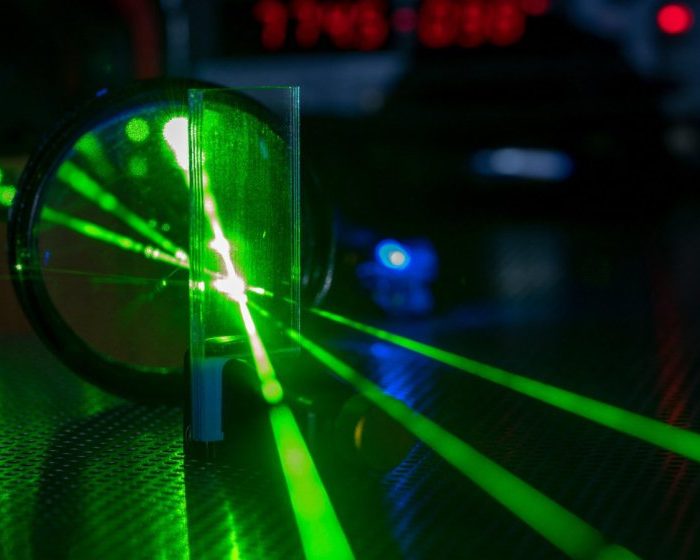 Swimmer made of quantum light breaks Newton’s third law